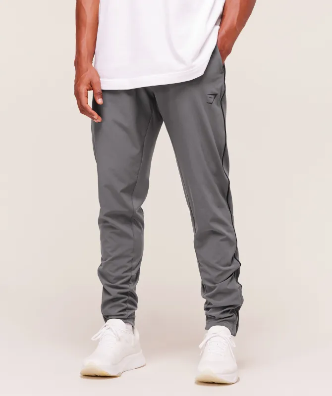 Gymshark Arrival Woven Block Joggers - Dark Grey sold by Gymshark