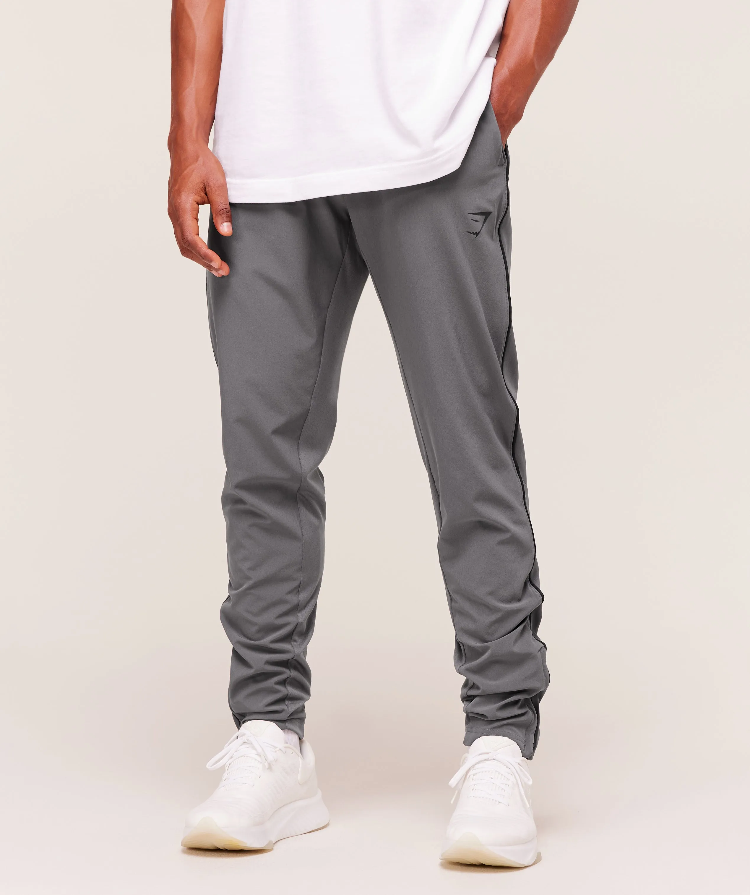 Gymshark Arrival Woven Block Joggers - Dark Grey sold by Gymshark