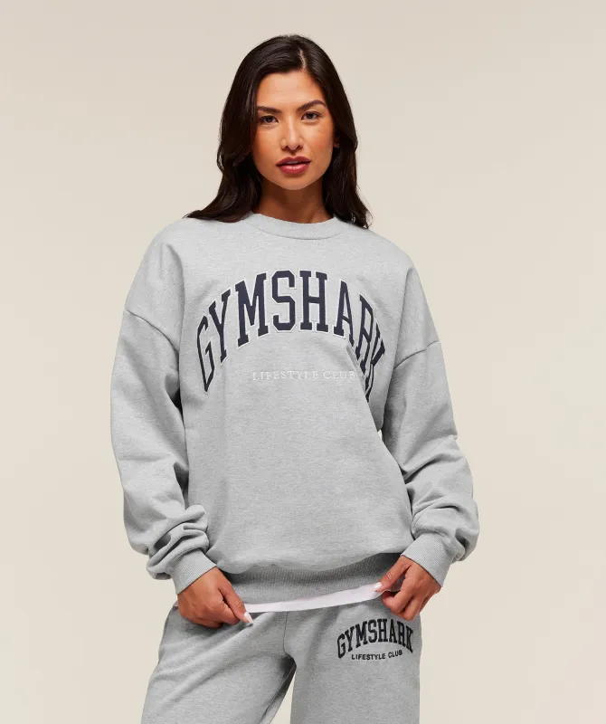 Gymshark Collegiate Graphic Crew Neck Pullover - Light Grey Core Marl sold by Gymshark