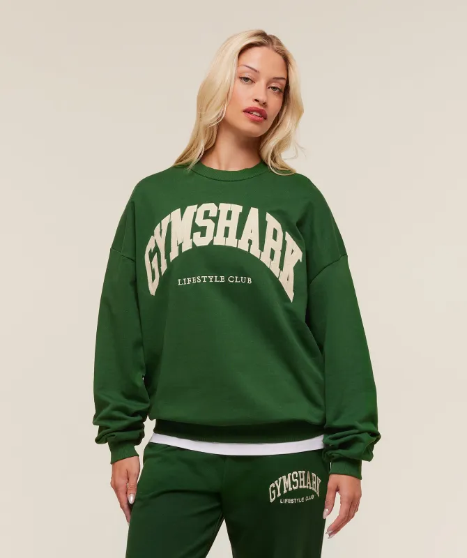 Gymshark Collegiate Graphic Crew Neck Pullover - Athletic Green sold by Gymshark