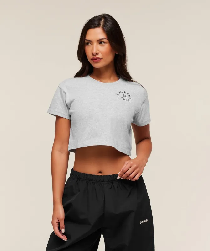 Gymshark Fitness Embroidered Graphic Oversized Crop Top - Light Grey Core Marl sold by Gymshark
