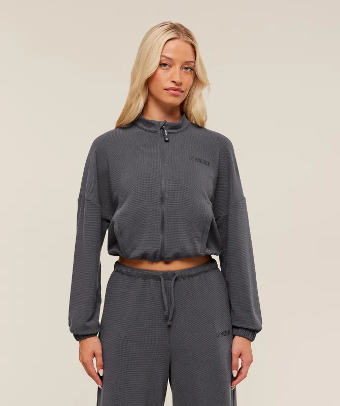 Gymshark Waffle Midi Zip Up Jacket - Onyx Grey sold by Gymshark