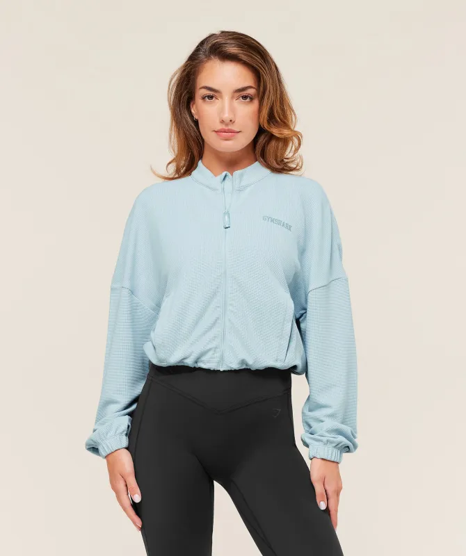 Gymshark Waffle Midi Zip Up Jacket - Smoke Blue sold by Gymshark