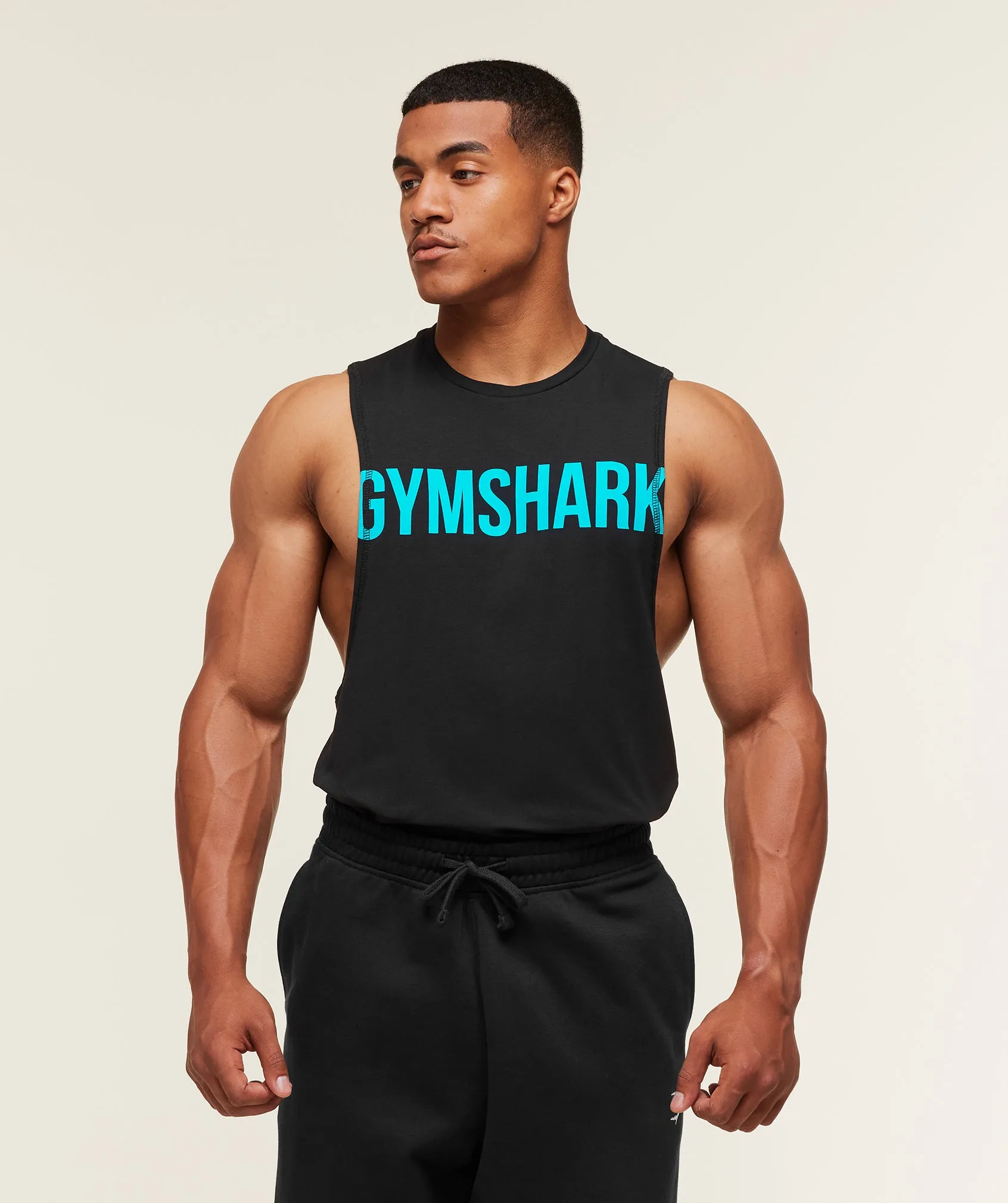 Gymshark Prime Drop Arm Tank - Black/Brand Blue sold by Gymshark