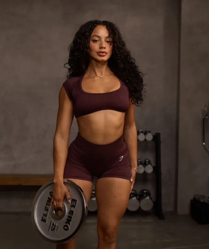 Gymshark Adapt Fleck x Whitney Short Sleeve Crop Top - Cherry Purple/Rich Maroon sold by Gymshark