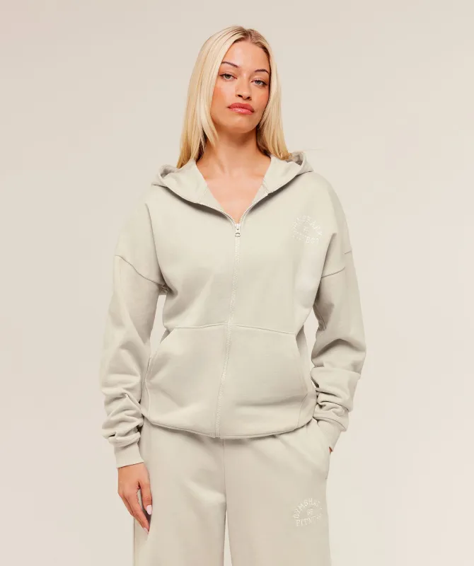 Gymshark Fitness Embroidered Graphic Zip Up Hoodie - Pebble Grey sold by Gymshark
