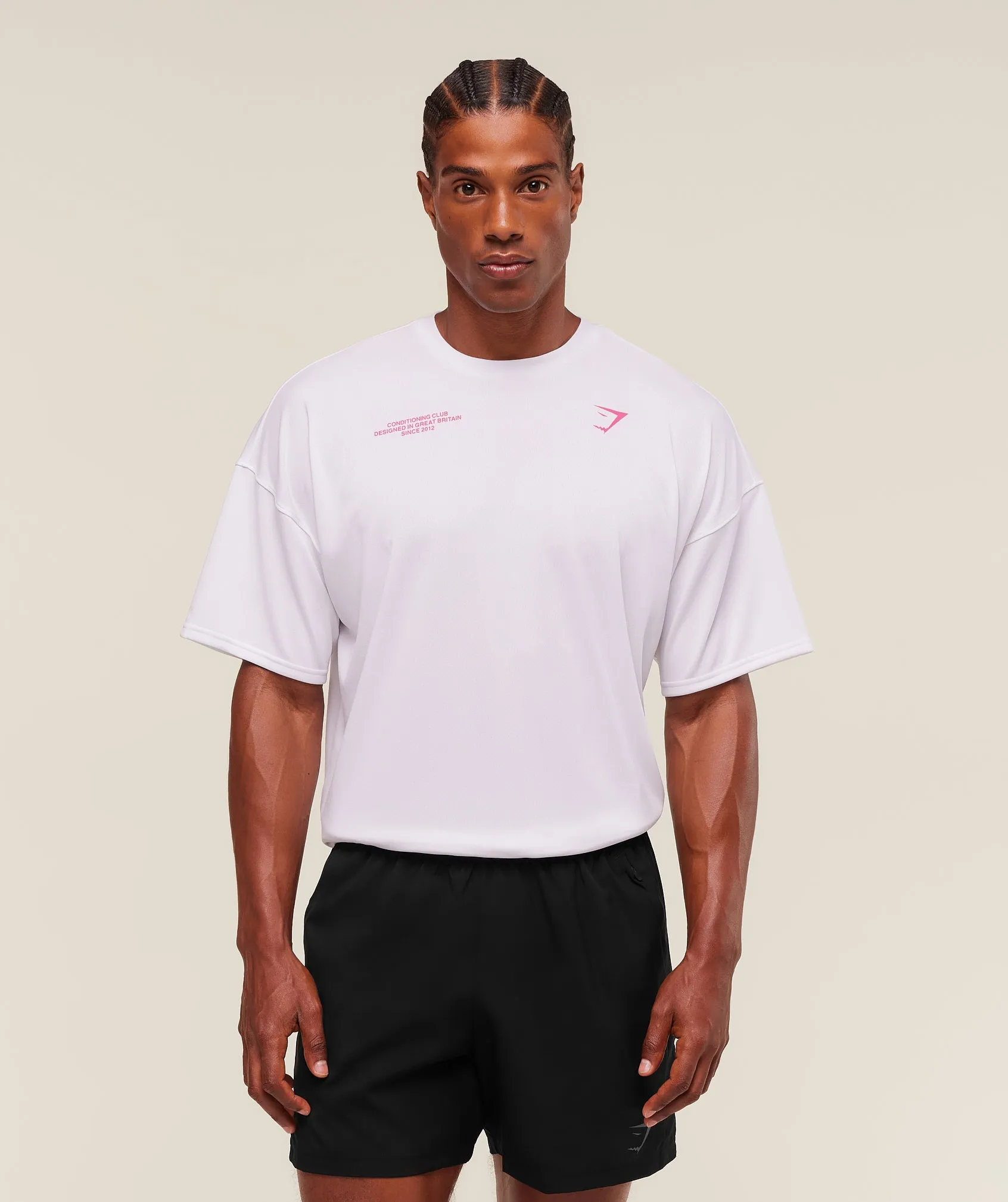 Gymshark Conditioning Club Oversized T-Shirt - White/Energy Pink sold by Gymshark