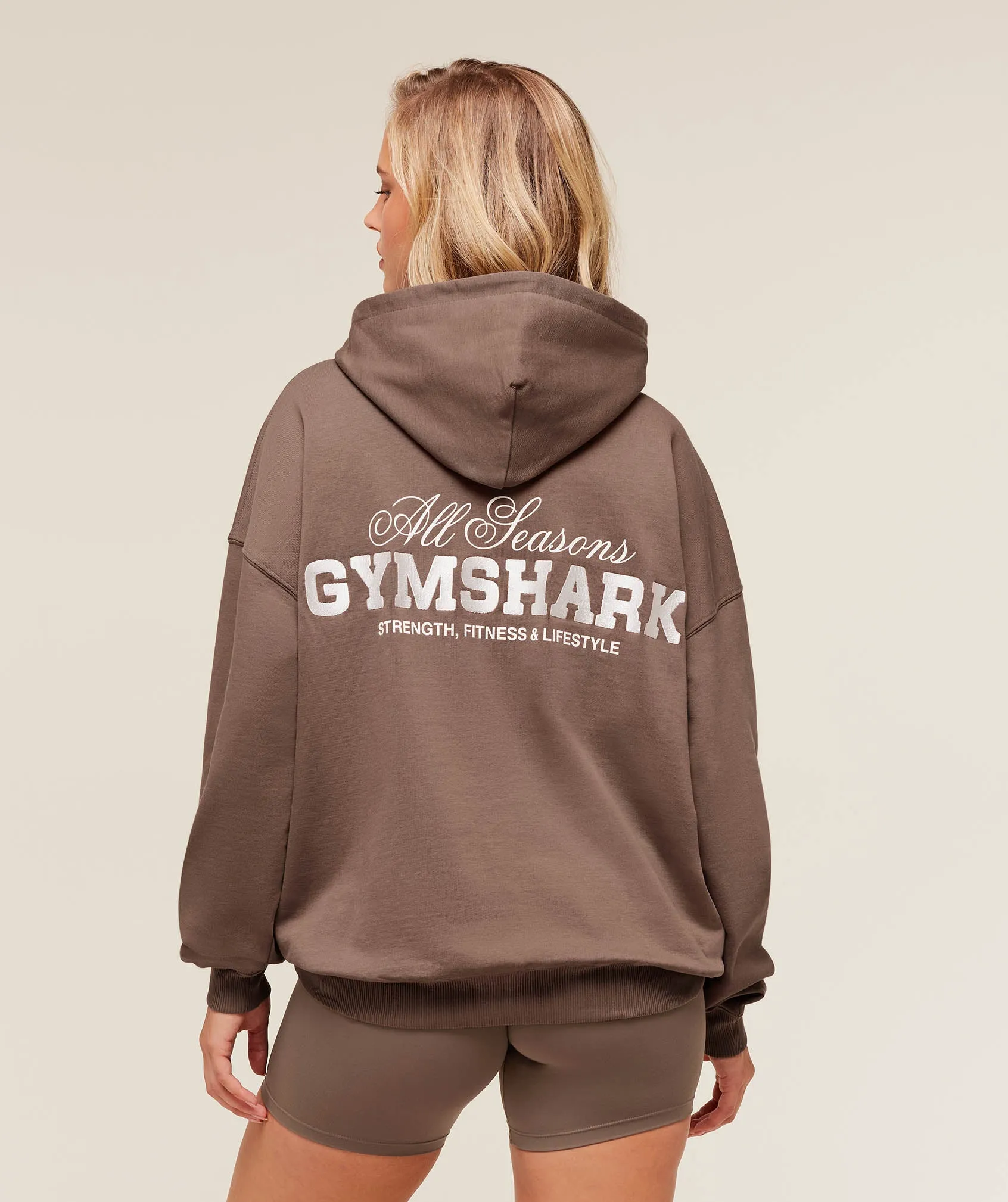 Gymshark All Seasons Graphic Hoodie - Soft Brown sold by Gymshark