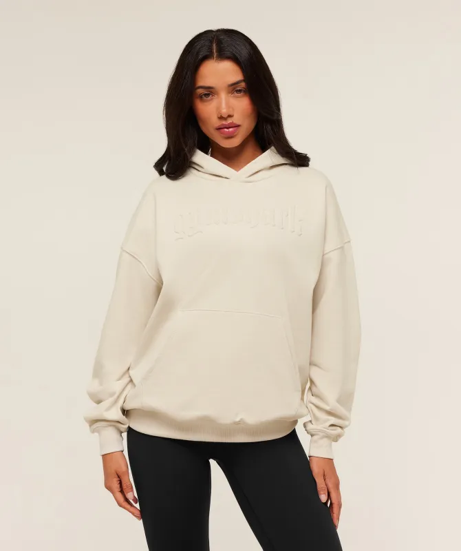 Gymshark Embossed Graphic Oversized Hoodie - Oat White sold by Gymshark