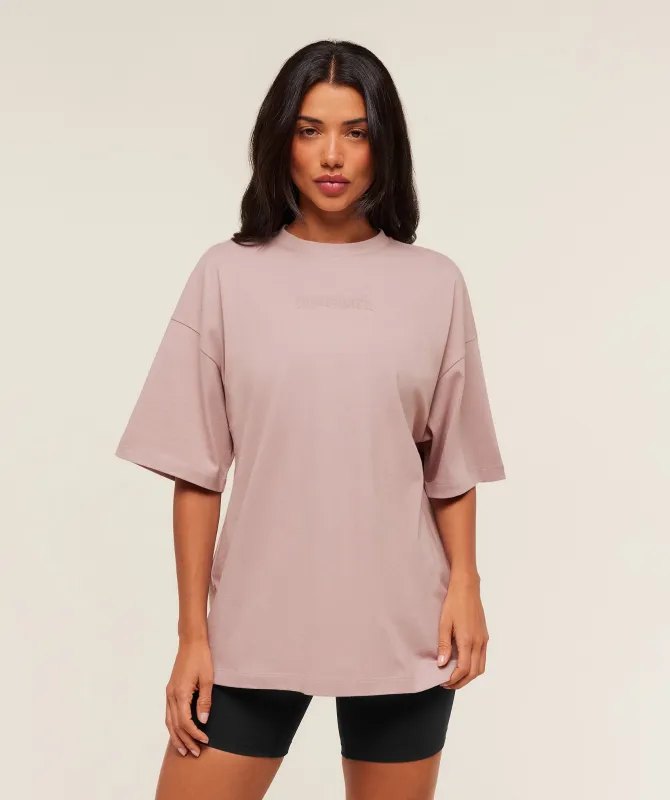 Gymshark Embossed Graphic Oversized T-Shirt - Muted Pink sold by Gymshark