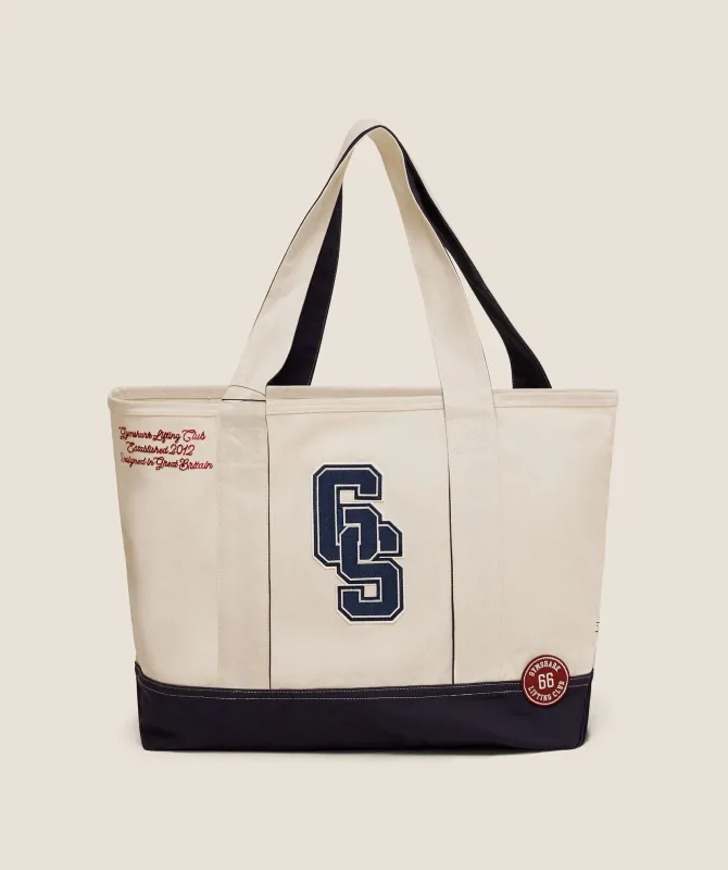 Gymshark Collegiate Tote Bag - Heavy Blue/Oat White/Athletic Burgundy sold by Gymshark