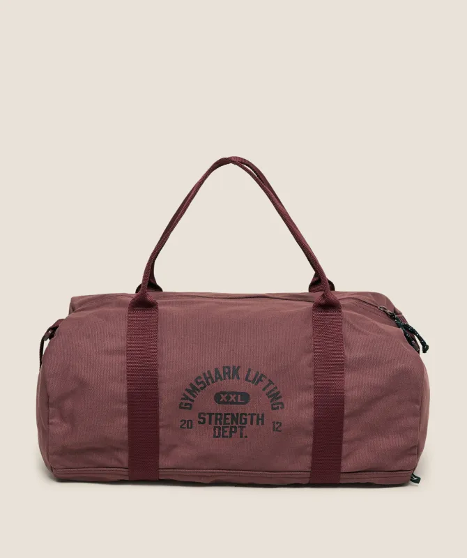 Gymshark Strength Dept Canvas Duffle Bag - Burgundy Brown sold by Gymshark