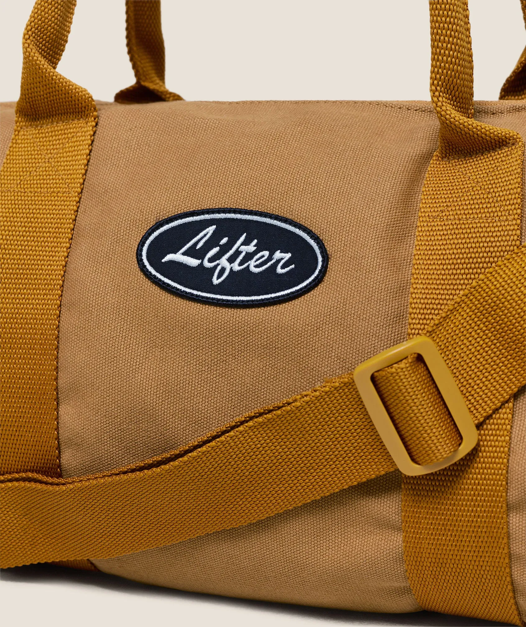 Gymshark Strength Dept Mini Canvas Duffle Bag - Antique Gold sold by Gymshark product image thumbnail 4