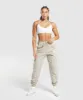 Gymshark Legacy Joggers - Washed Stone Brown sold by Gymshark