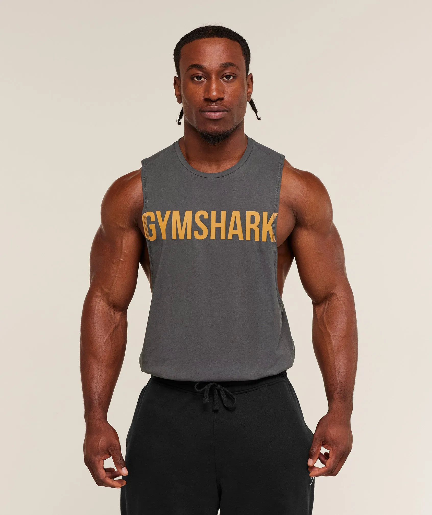 Gymshark Prime Drop Arm Tank - Onyx Grey/Antique Gold sold by Gymshark