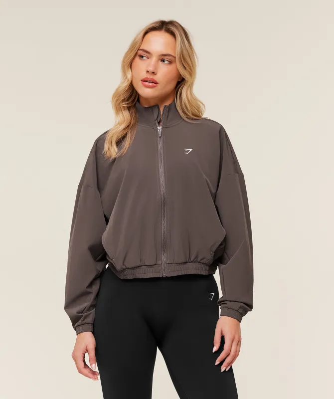 Gymshark Training Everyday Woven Jacket - Cool Brown sold by Gymshark