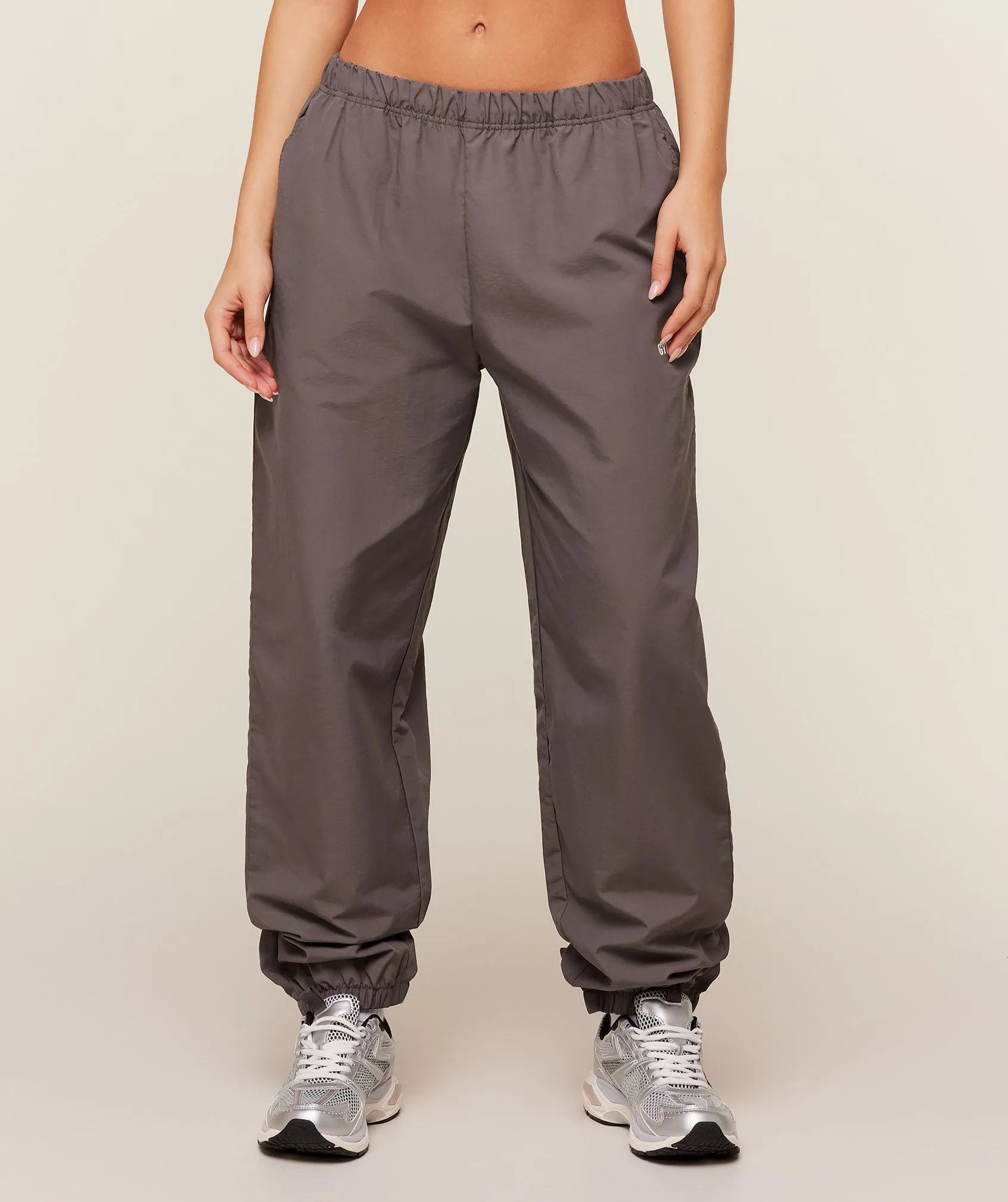 Gymshark Woven Track Pant - Cool Brown sold by Gymshark