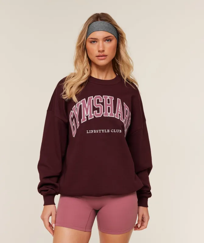 Gymshark Collegiate Graphic Crew Neck Pullover - GS Rich Maroon sold by Gymshark