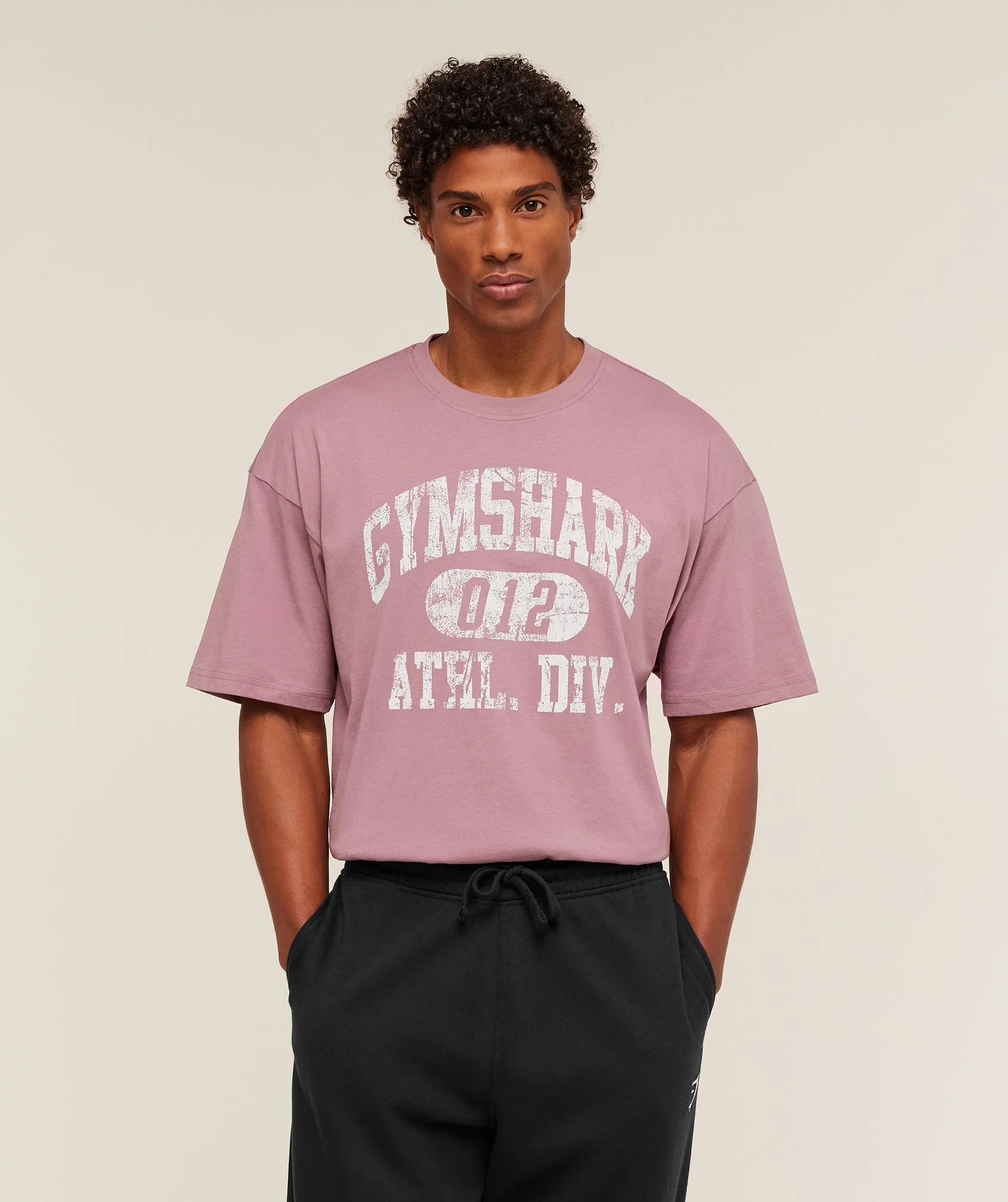 Gymshark Athletic Division Graphic T-Shirt - Calm Pink sold by Gymshark