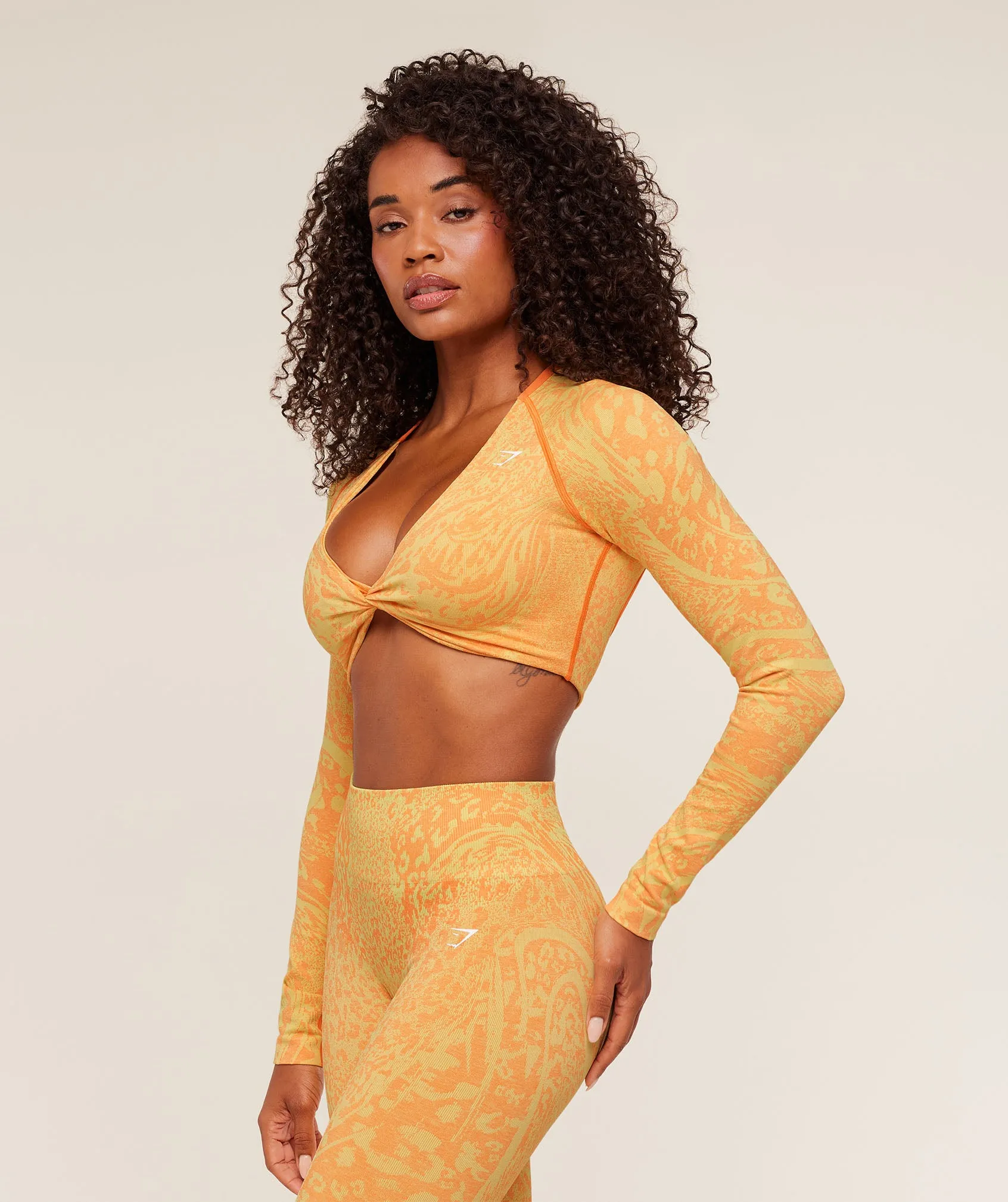 Gymshark Adapt Animal X Whitney Long Sleeve Crop Top - Sorbet Yellow / Dayglow Peach sold by Gymshark product image thumbnail 4