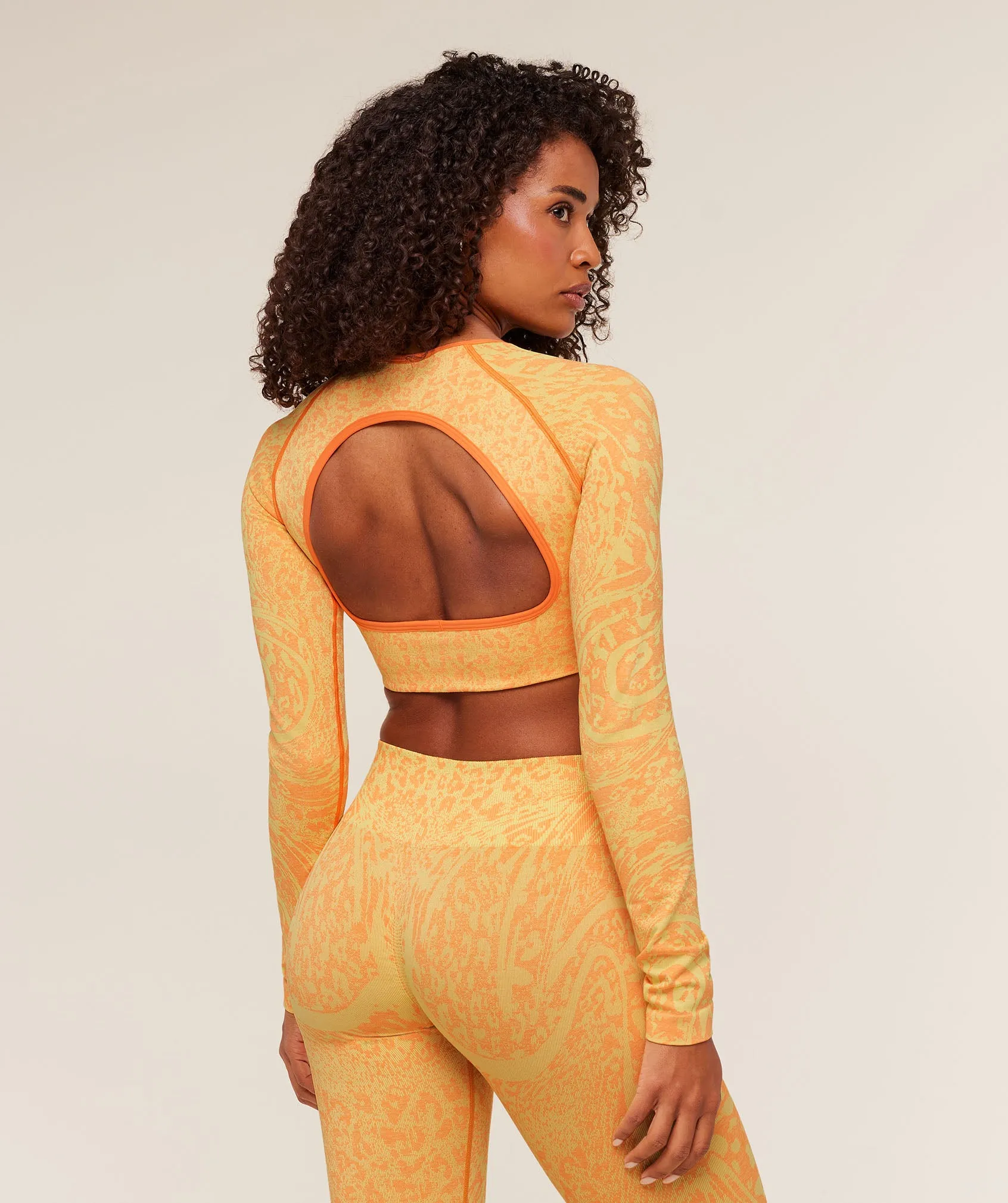 Gymshark Adapt Animal X Whitney Long Sleeve Crop Top - Sorbet Yellow / Dayglow Peach sold by Gymshark product image thumbnail 3