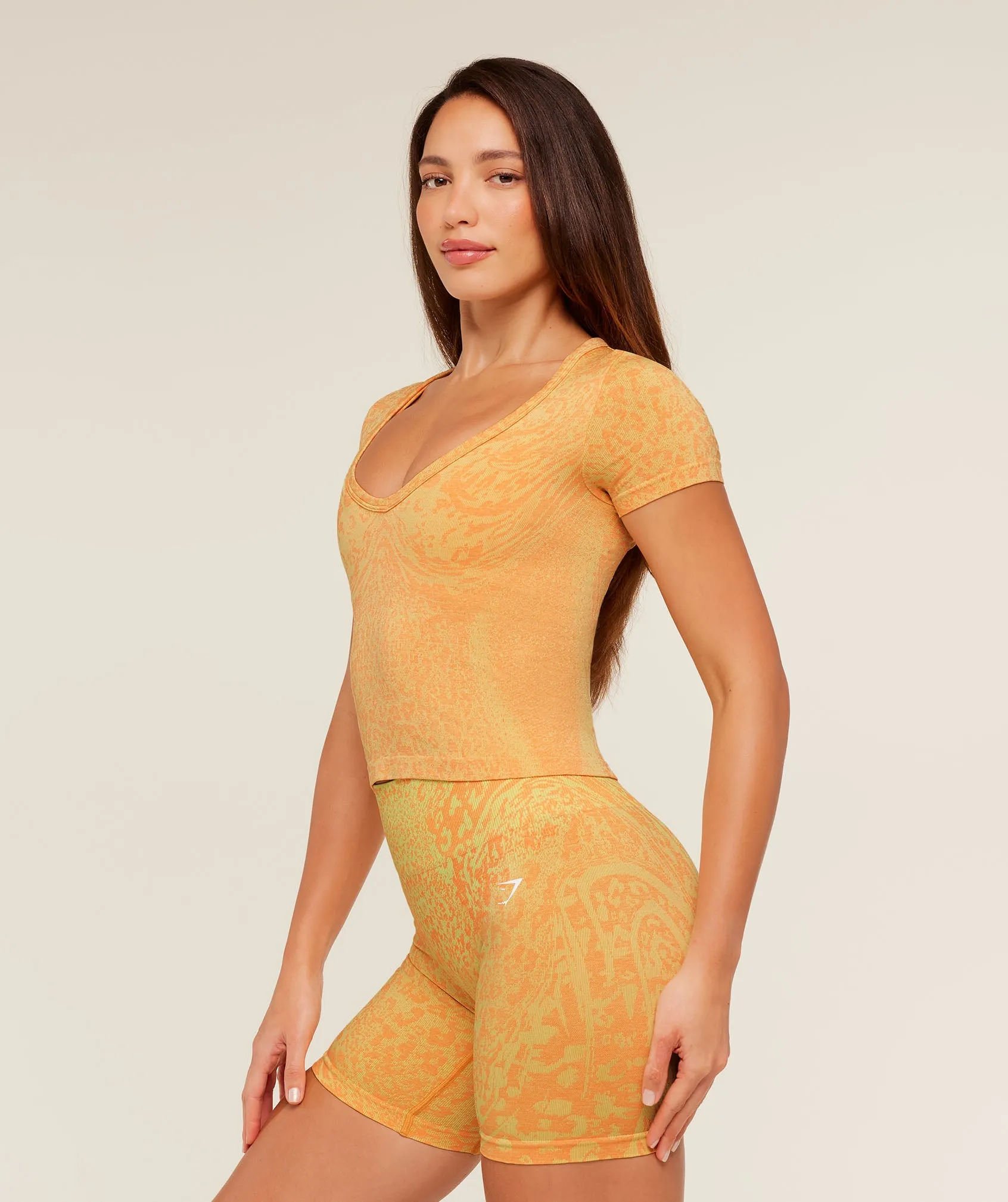 Gymshark Adapt Animal X Whitney Short Sleeve Top - Sorbet Yellow / Dayglow Peach sold by Gymshark product image thumbnail 4