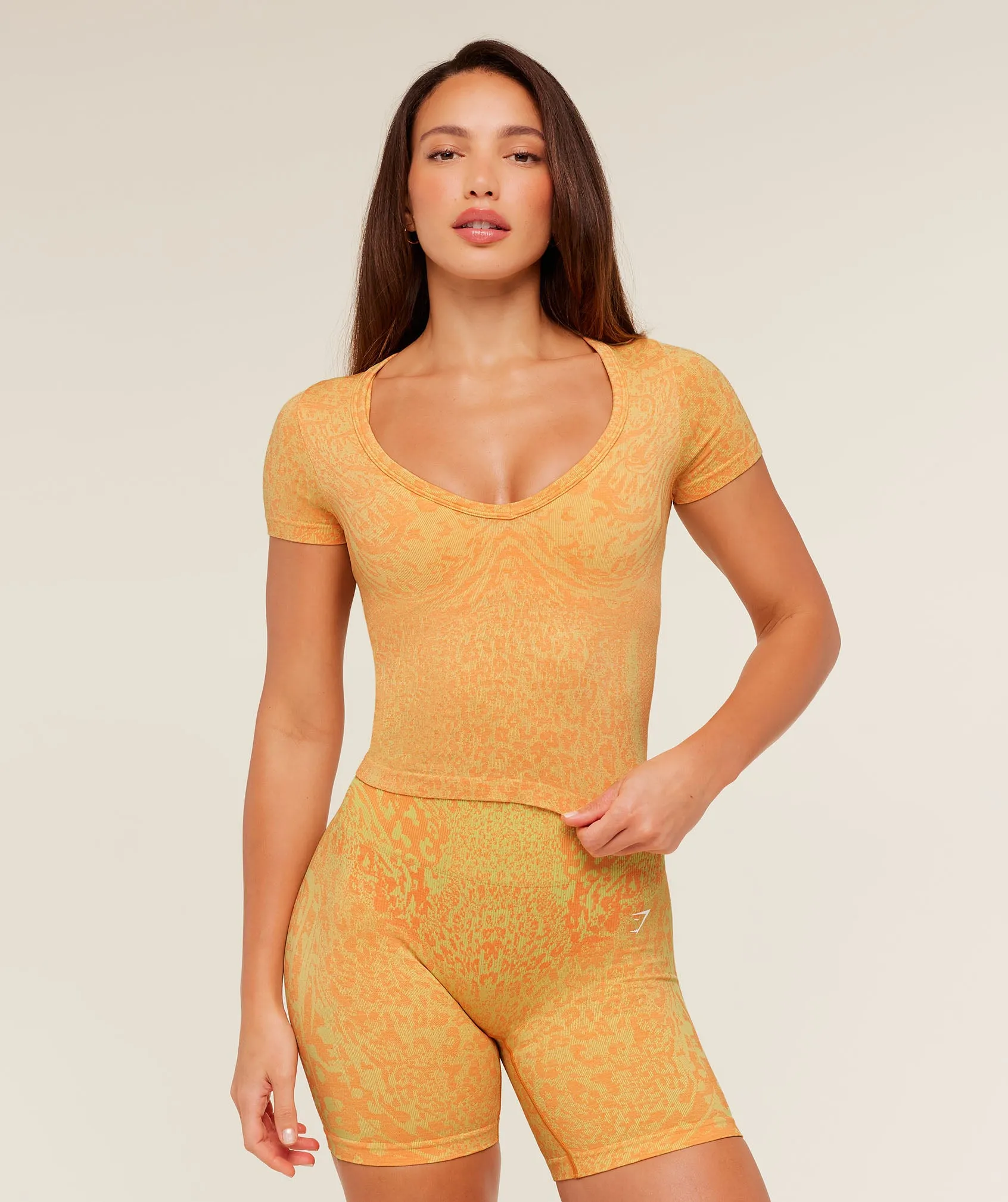 Gymshark Adapt Animal X Whitney Short Sleeve Top - Sorbet Yellow / Dayglow Peach sold by Gymshark