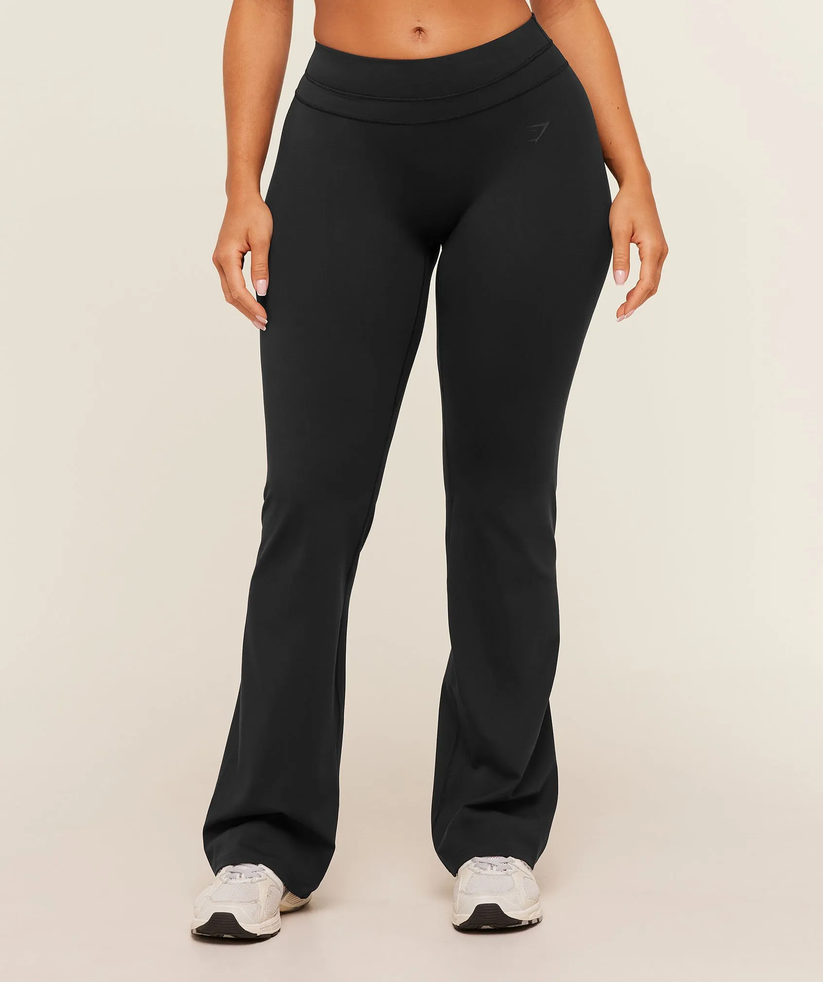 Gymshark Whitney Mid-High Rise Flared Leggings - Black sold by Gymshark