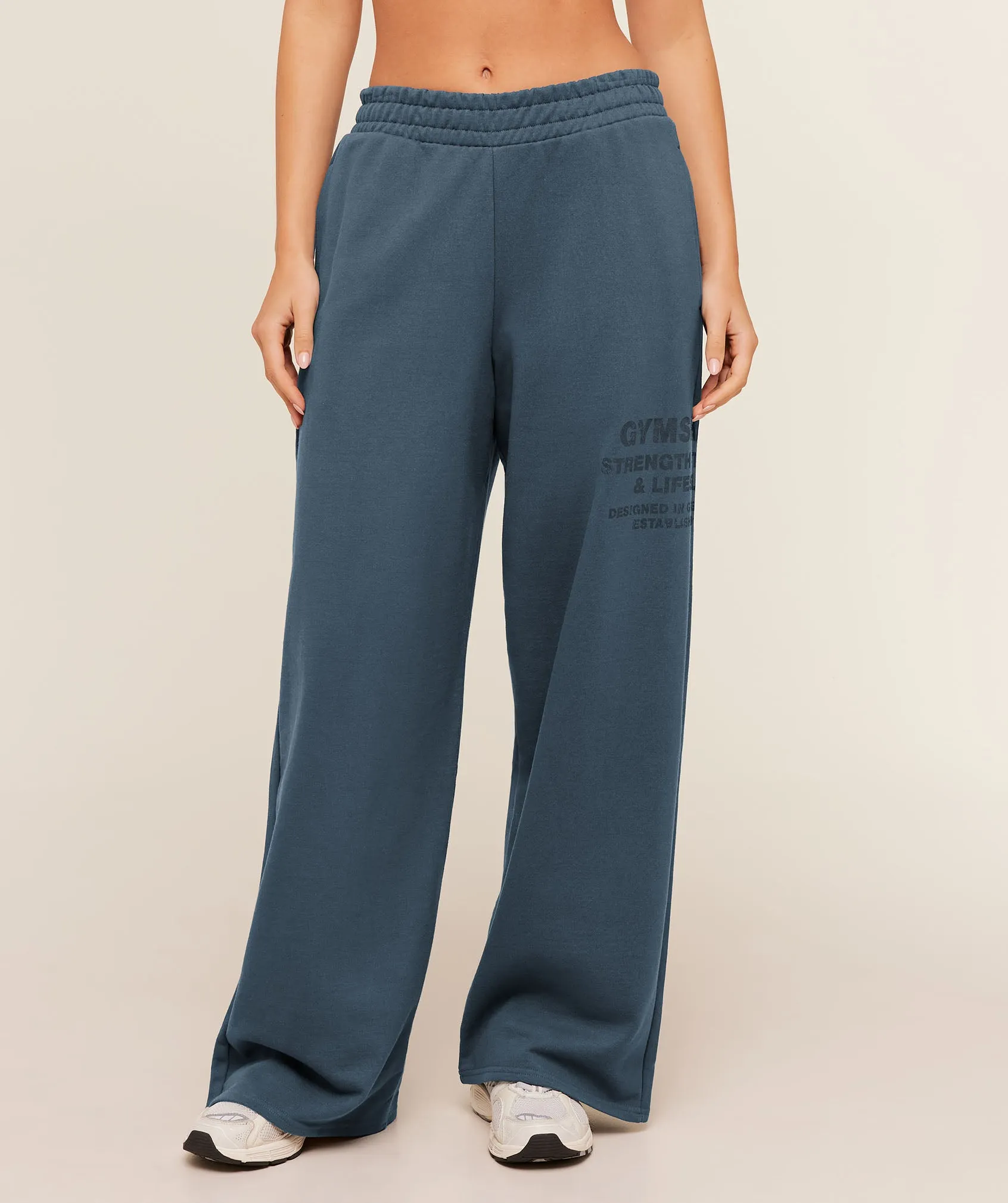 Gymshark Stacked Graphic Wide Leg Joggers - Stealth Blue sold by Gymshark
