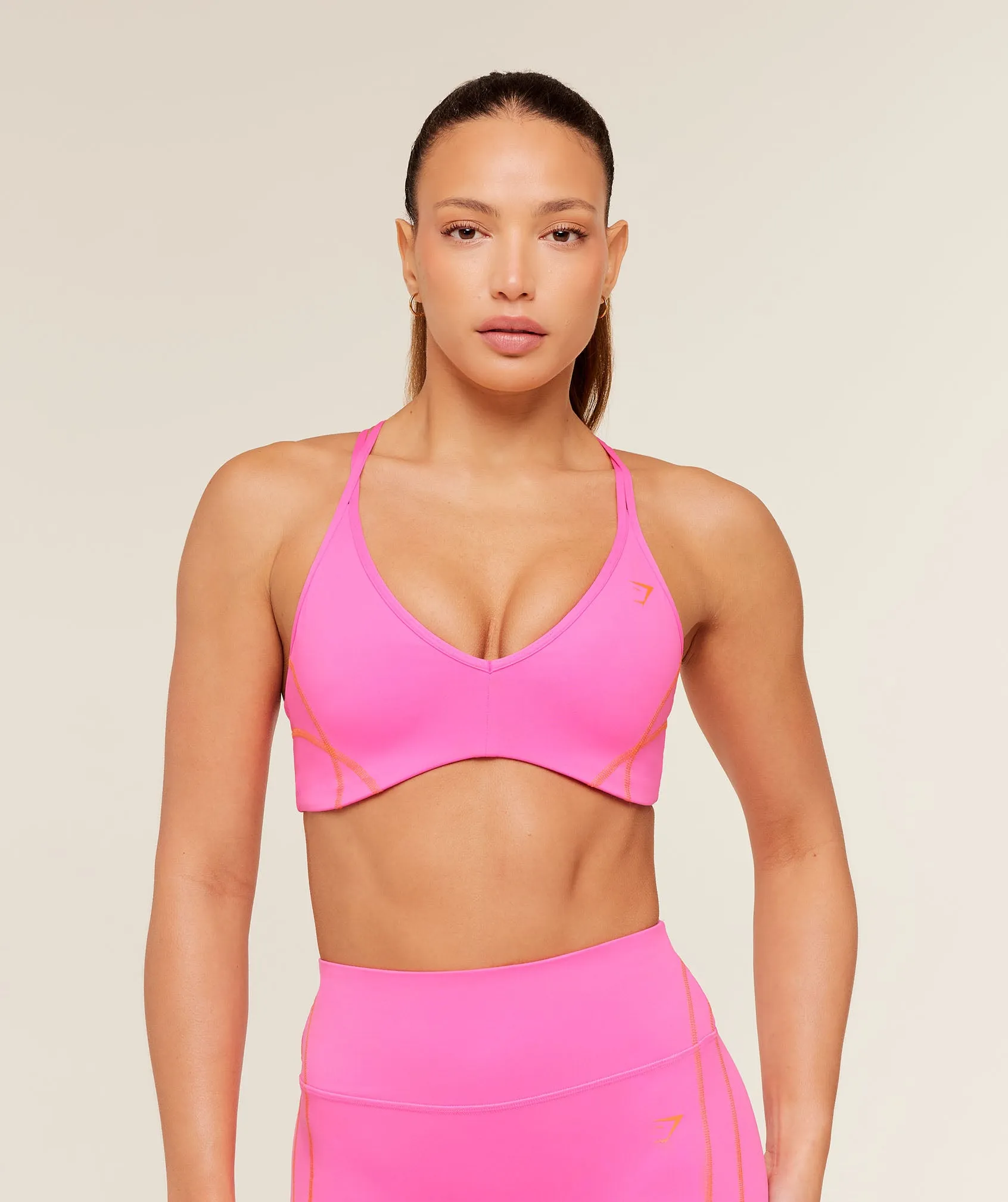 Gymshark Volt Light Support Sports Bra - Electric Pink/Dayglow Peach sold by Gymshark