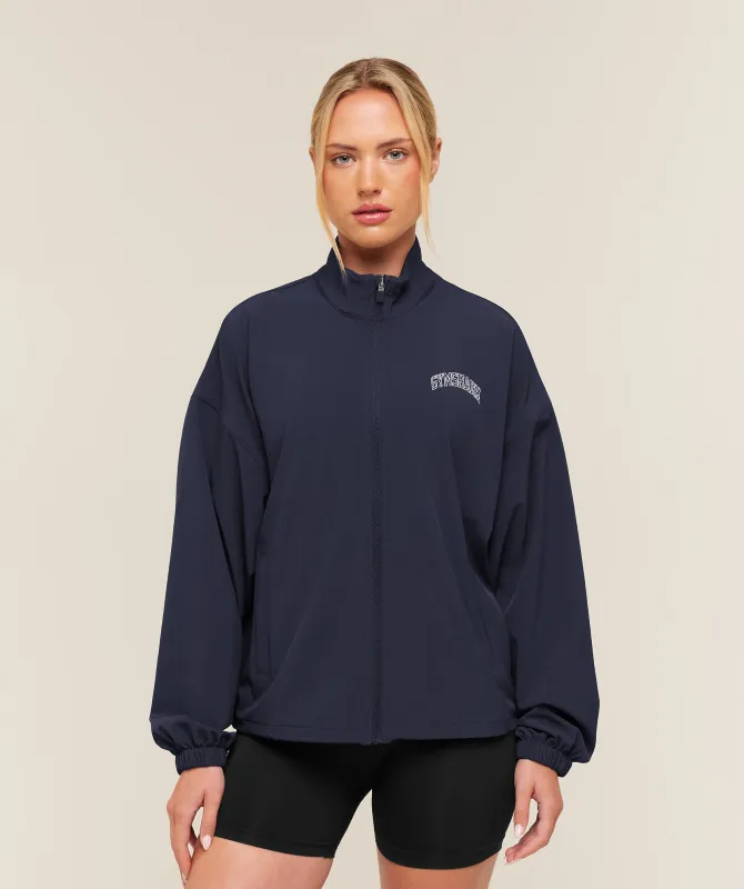 Gymshark College Crest Graphic Track Jacket - Heavy Blue made by Gymshark