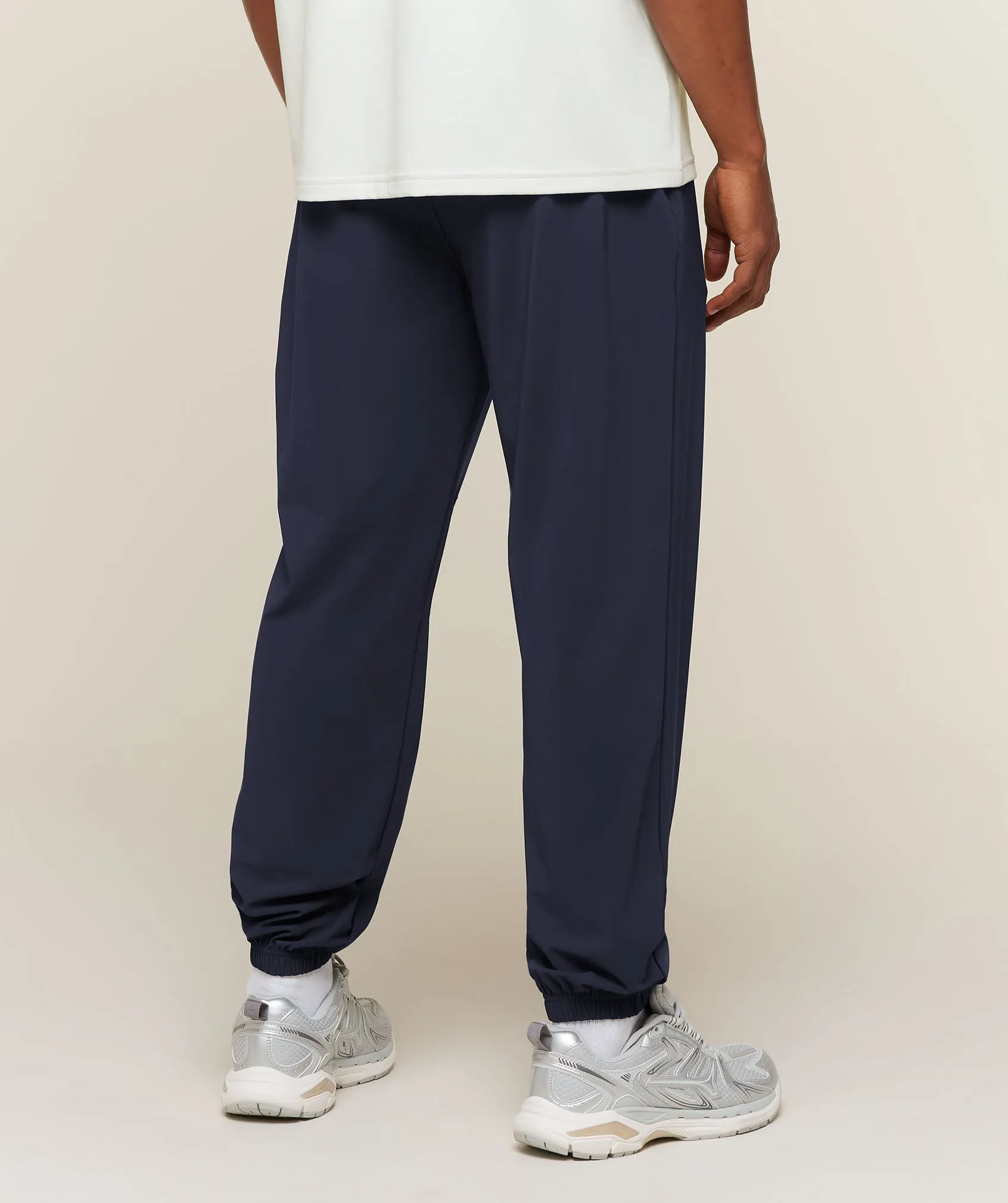 Gymshark Campus Crest Cuffed Woven Pant - Heavy Blue sold by Gymshark product image thumbnail 3
