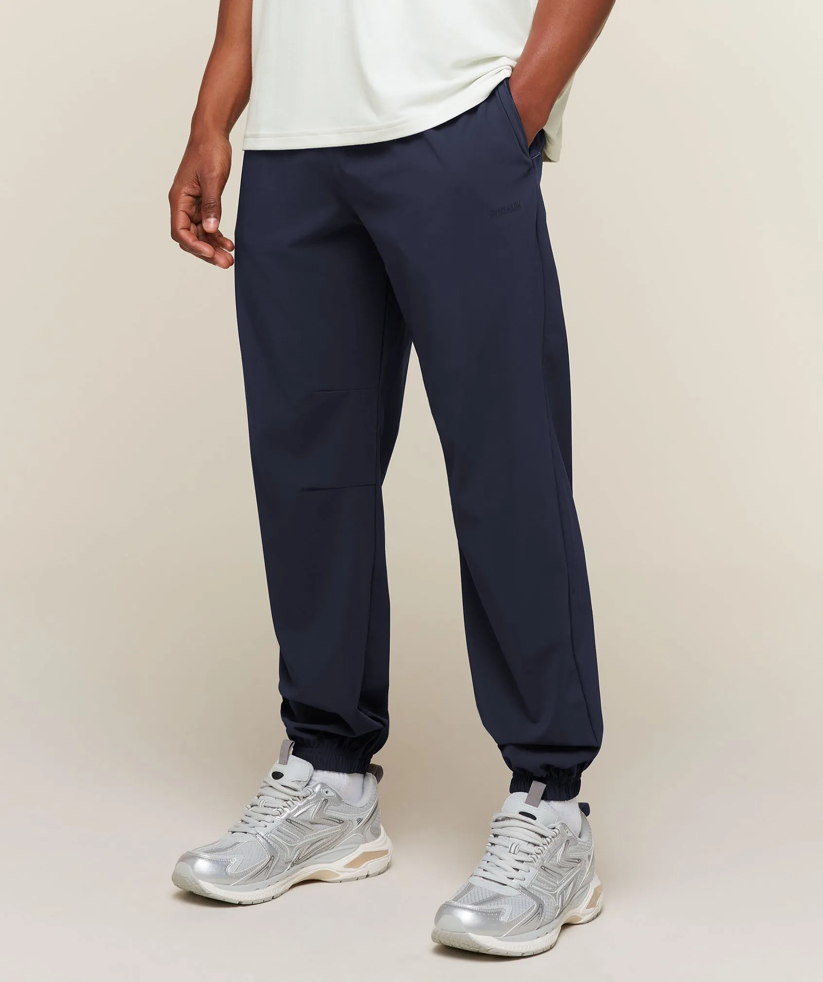Gymshark Campus Crest Cuffed Woven Pant - Heavy Blue sold by Gymshark product image thumbnail 2