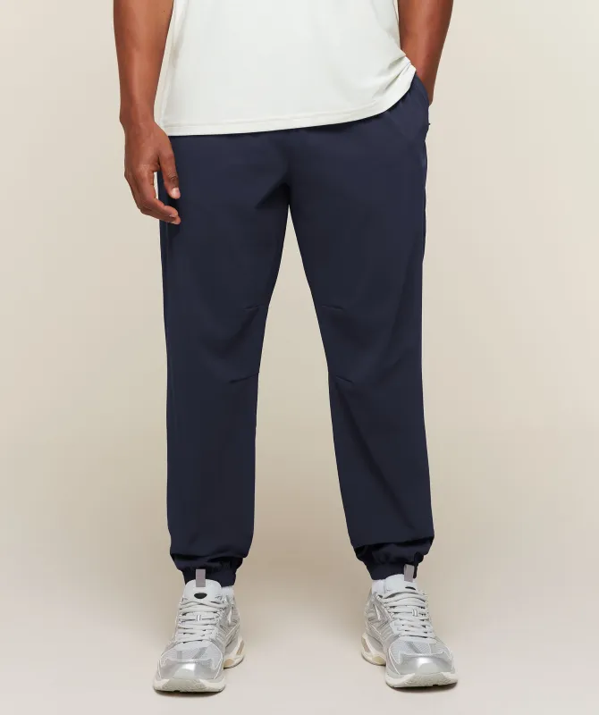 Gymshark Campus Crest Cuffed Pants - Heavy Blue made by Gymshark