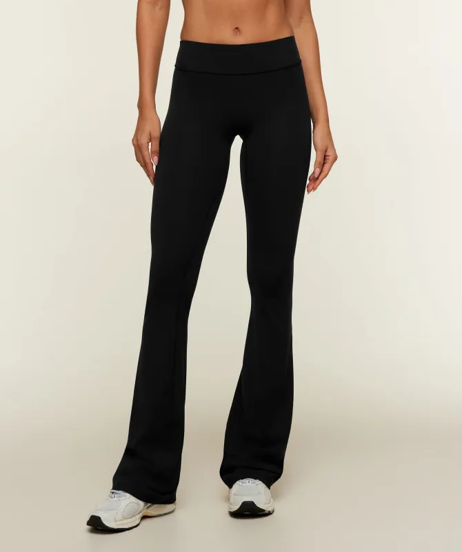 Gymshark SoftSense™ Mid-Rise Flared Leggings Tall - Black made by Gymshark