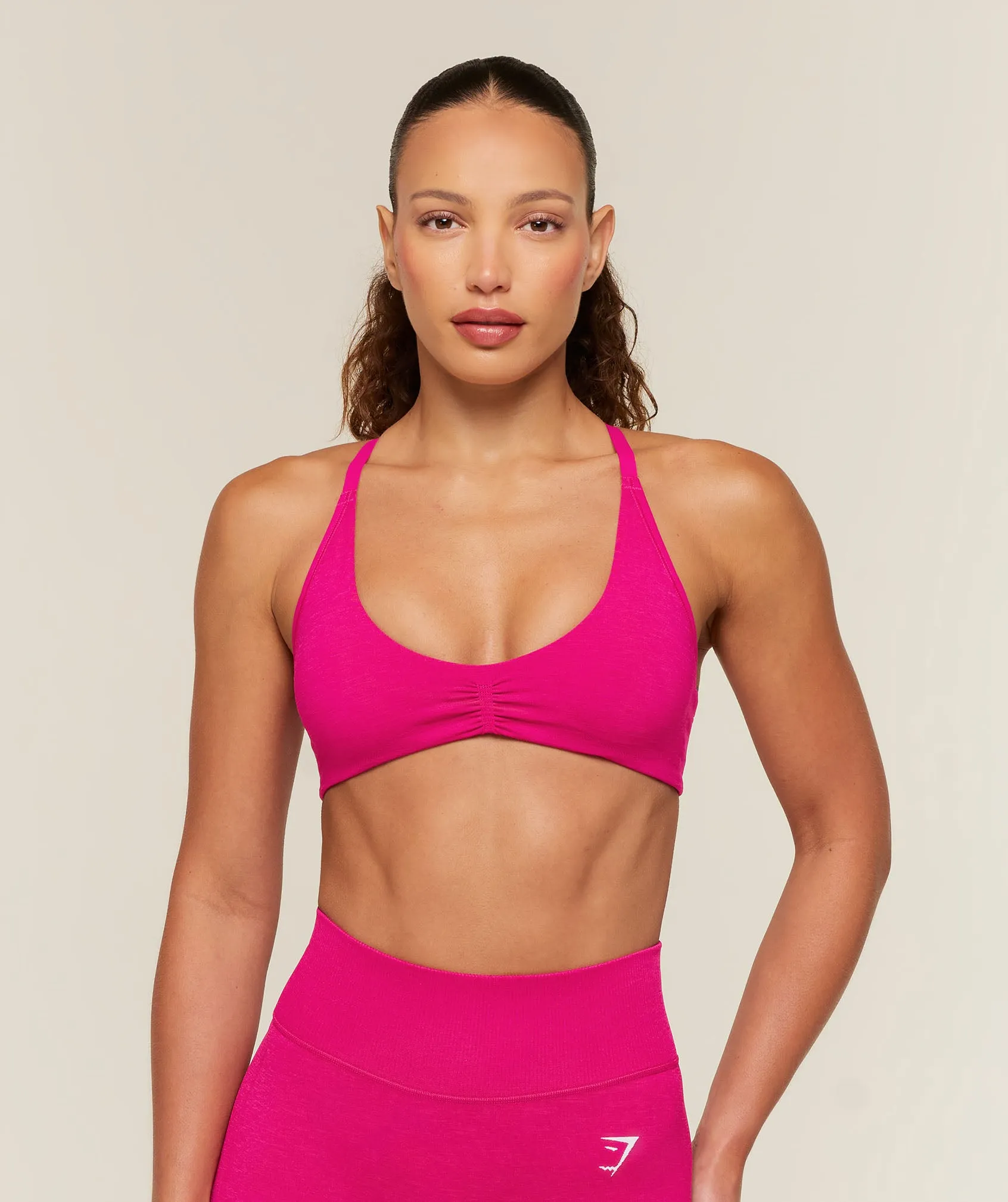 Gymshark Relay Seamless Light Support Sports Bra - Performance Pink sold by Gymshark