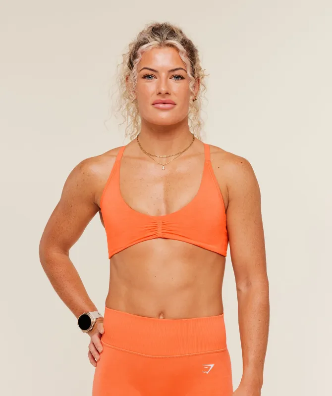 Gymshark Relay Seamless Light Support Sports Bra - Dayglow Peach made by Gymshark