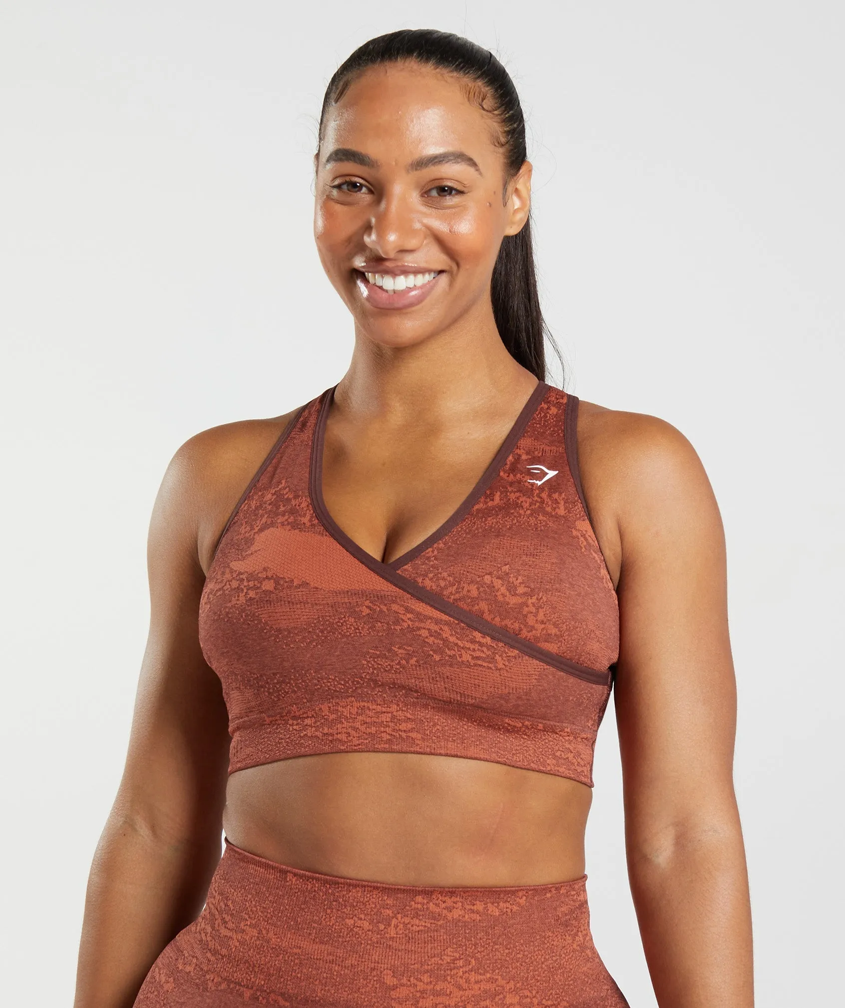 Gymshark Adapt Camo Seamless Sports Bra - Storm Red/Cherry Brown sold by Gymshark