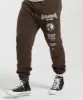 Gymshark Global Lifting Oversized Essential Joggers - Brown sold by Gymshark
