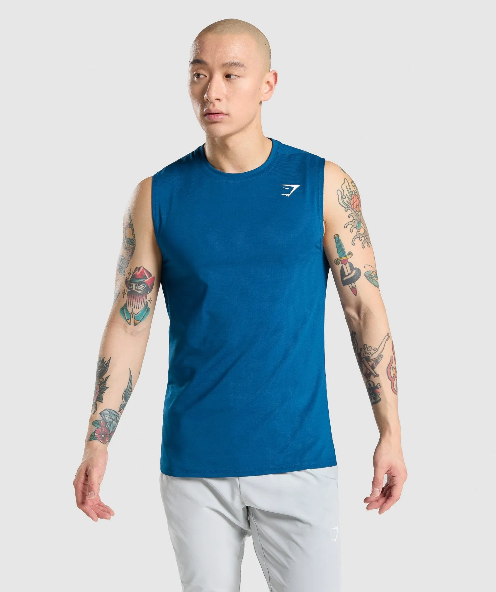 Gymshark Arrival Sleeveless Tee - Petrol Blue sold by Gymshark