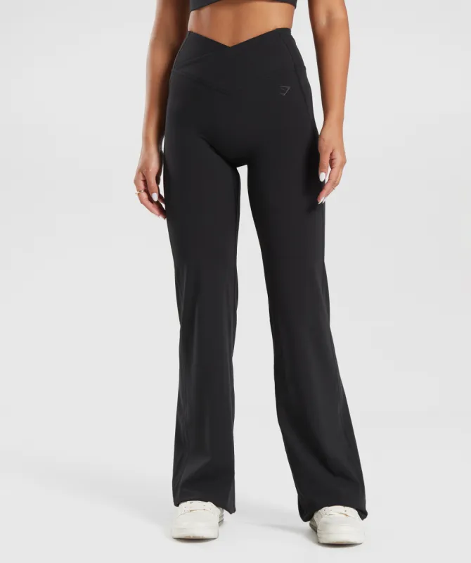 Gymshark Crossover Flared Leggings - Black sold by Gymshark