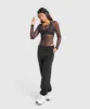 Gymshark Elevate Mesh Bodysuit - Black sold by Gymshark