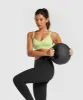 Gymshark Strappy Back Light Support Sports Bra - Pastel Sage Green sold by Gymshark