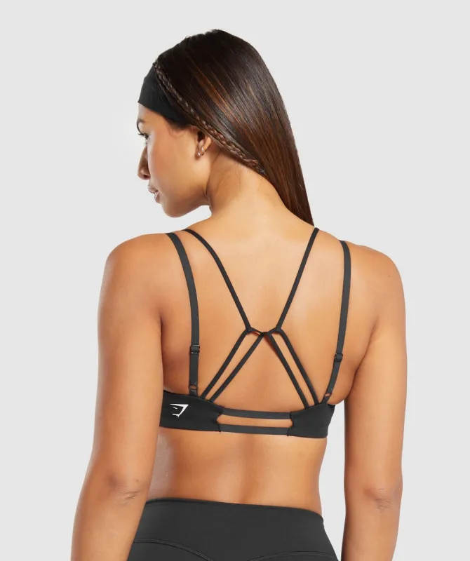 Gymshark Strappy Back Light Support Sports Bra - Black sold by Gymshark