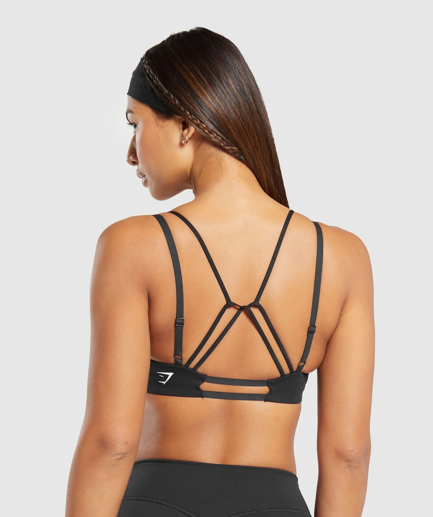 Gymshark Strappy Back Light Support Sports Bra - Black sold by Gymshark
