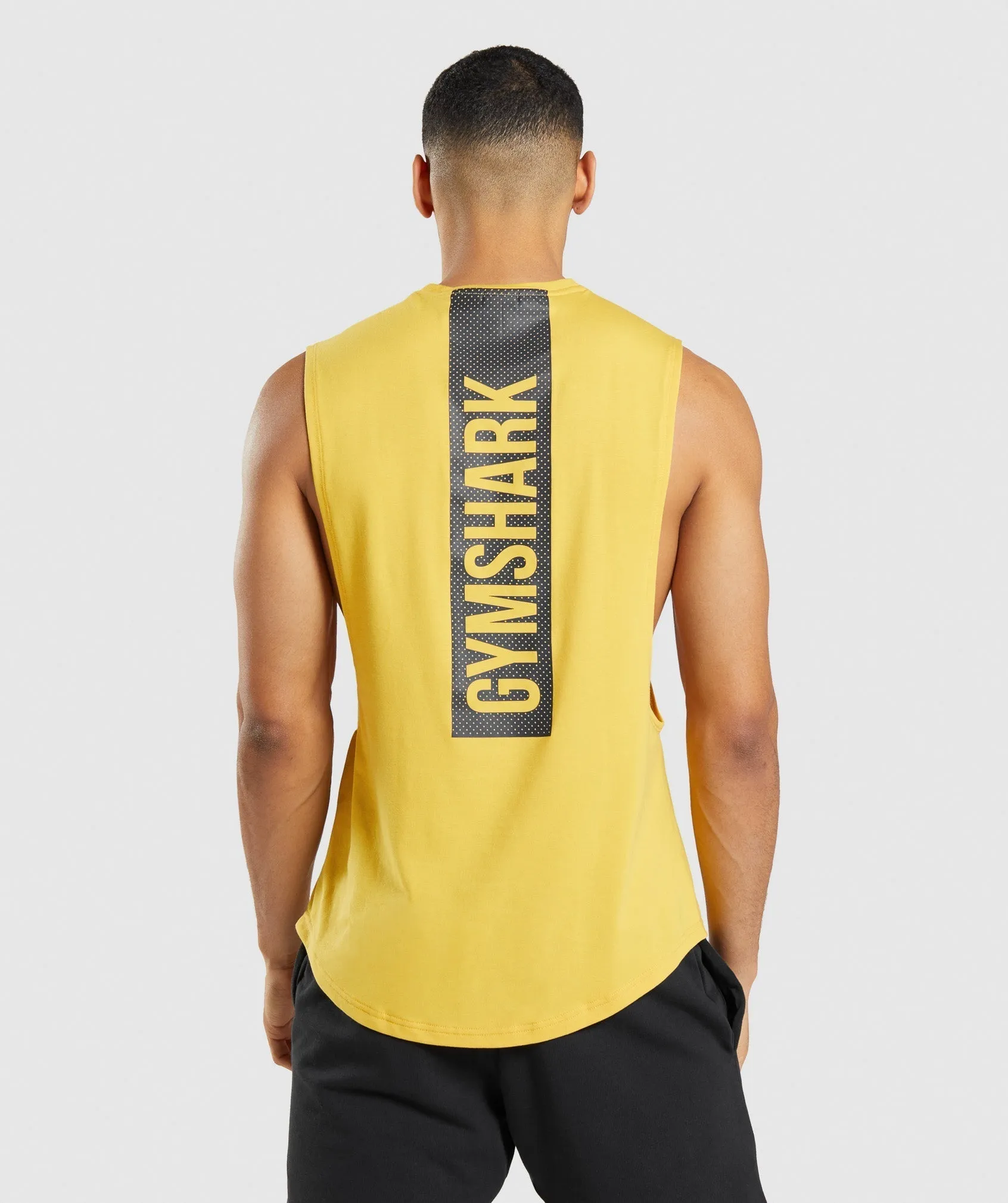 Gymshark Bold Drop Arm Tank - Medallion Yellow sold by Gymshark