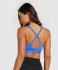 Gymshark Peek A Boo Sports Bra - Iris Blue sold by Gymshark