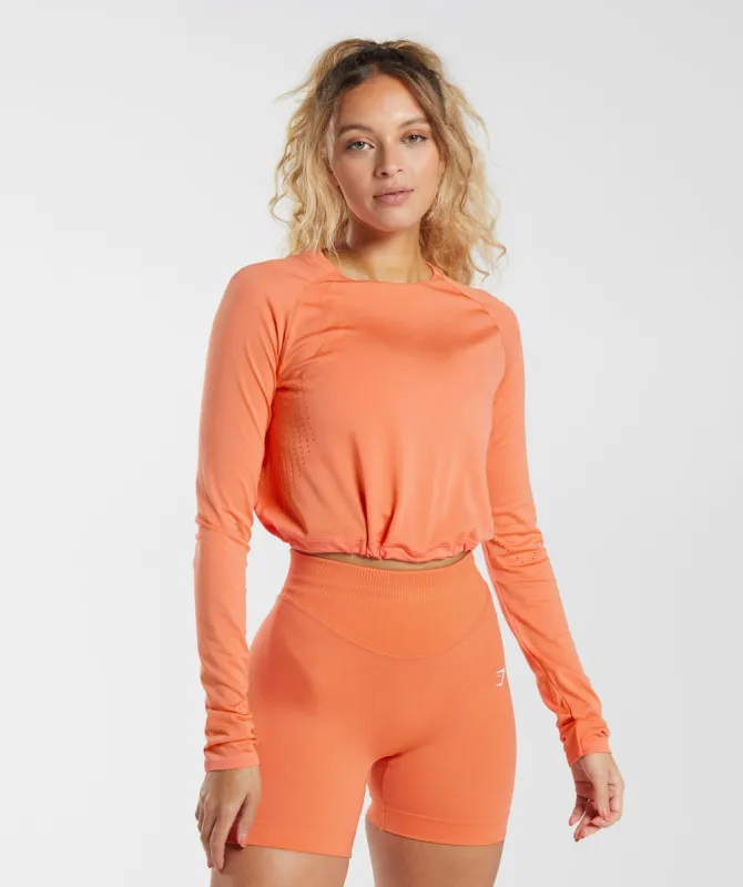 Gymshark Sweat Seamless Long Sleeve Crop Top - Aerospace Orange sold by Gymshark