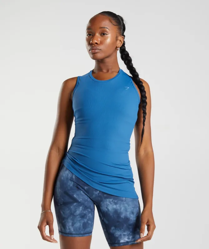 Gymshark Elevate Asymmetric Tank - Lakeside Blue sold by Gymshark