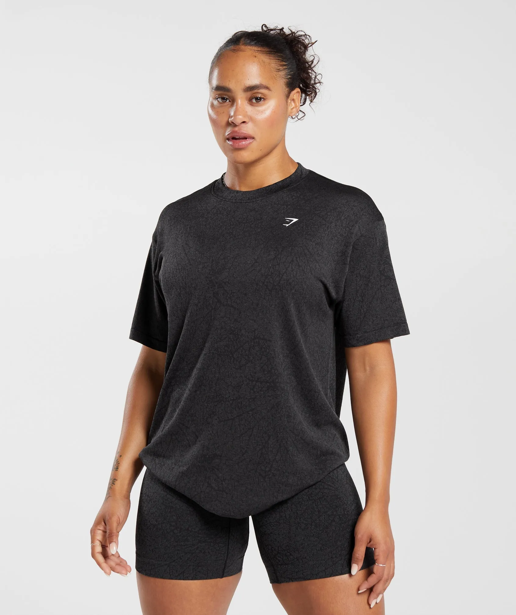 Gymshark Adapt Pattern Seamless Loose Top - Black/Graphite Grey sold by Gymshark